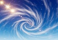 Whirling galaxy-inspired image with a bright blue sky backdrop. Royalty Free Stock Photo