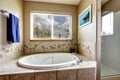 Whirlpool bath tub with tile trim Royalty Free Stock Photo