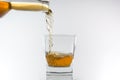 Whiskey being poured into a glass Royalty Free Stock Photo