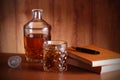 Whiskey, books and pen Royalty Free Stock Photo
