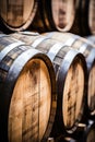 Whiskey, bourbon, scotch or wine barrels in an aging facility.