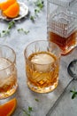 Whiskey, brandy or bourbon alcohol drink in crystal glasses