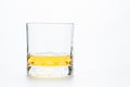 Whiskey or brandy in rock glass or Old Fashioned glass  isolated Royalty Free Stock Photo