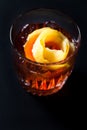 Whiskey and campari cocktail garnished with orange peel Royalty Free Stock Photo