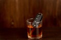 Whiskey with car keys and handcuffs. Concept for drinking and driving Royalty Free Stock Photo