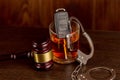 Whiskey with car keys and handcuffs. Concept for drinking and driving Royalty Free Stock Photo