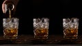 Whiskey or cognac is poured into an old fashioned glass