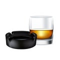 Whiskey glass and ashtray isolated