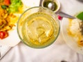 Whiskey glass with ice cubes on restaurant,Dinner of friends,meeting have fun,yellow,alcoho Royalty Free Stock Photo