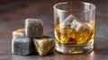 Whiskey glass with ice stones on a dark textured surface. Royalty Free Stock Photo