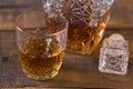 whiskey in glass on wood background