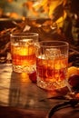 Whiskey Glasses with Ice and Fruit Background