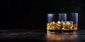 Whiskey with ice in modern glasses Royalty Free Stock Photo