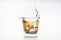 Whiskey and ice. Rum with ice. Brown brandy with splashes. Royalty Free Stock Photo