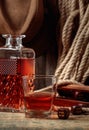 Whiskey, pipe, and dice on an wooden table Royalty Free Stock Photo