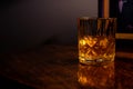 Whiskey on the rocks in a crystal tumbler Royalty Free Stock Photo