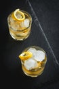 Whiskey on the rocks with lemon Royalty Free Stock Photo