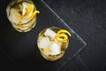 Whiskey on the rocks with lemon Royalty Free Stock Photo