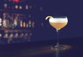 Whiskey Sour Cocktail - Bourbon with Lemon Juice, Sugar Syrup and Egg White in a special glass with copy space