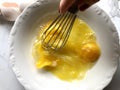 Whisking egg yolks