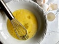 Whisking egg yolks