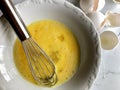 Whisking egg yolks