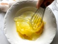 Whisking egg yolks