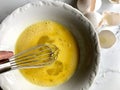 Whisking egg yolks