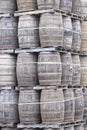 Whisky casks stacked at distillery for storage Royalty Free Stock Photo