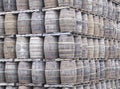 Whisky casks stacked at distillery for storage Royalty Free Stock Photo