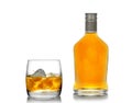 Whisky in a glass (with an ice) and a bottle Royalty Free Stock Photo