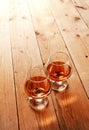 Whisky glasses on wood Royalty Free Stock Photo