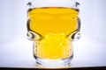 whisky, rum shat in a glass with a canius pattern Royalty Free Stock Photo