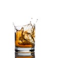 Whisky splash isolated on a white Royalty Free Stock Photo