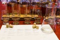 Whisky tasting setup with numbered sampling glasses, beaker and