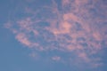 Whispy Clouds Turn Pink at Sunset