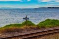 `Whistle` Sign along the Train Tracks by the Coast