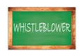 WHISTLEBLOWER text written on green school board