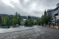 Whistler, BC, Canada - June 4, 2018. Olympic rings at Olympic Plaza on a rainy summer day.  Whistler was the Host Mountain Resort Royalty Free Stock Photo