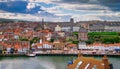 Whitby abbey is a seaside town and port at daytime in North Yorkshire, UK Royalty Free Stock Photo