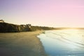 WHITBY in ENGLAND. People walking on Whitby beach on a fine sunny, windy day. In Whitby, North Yorkshire, England Royalty Free Stock Photo