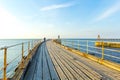 WHITBY, ENGLAND  Tourists visiting Whitby Pier Royalty Free Stock Photo