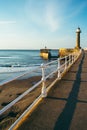 WHITBY, ENGLAND  Tourists visiting Whitby Pier Royalty Free Stock Photo