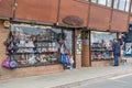 Seaside souvenir shop showing entrance and window displays