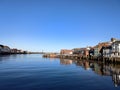 Whitby harbour blue sky over water North Yorkshire England UK Royalty Free Stock Photo