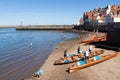 WHITBY, NORTH YORKSHIRE/UK - AUGUST 22 : Rowing boats beached on