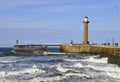 Whitby pier and lighthouse Royalty Free Stock Photo