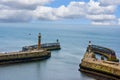 Whitby pier and lighthouse Royalty Free Stock Photo