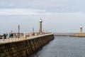 Whitby Pier, popular with tourists visiting the town of Whitby, North Yorkshire, UK