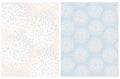 White Abstract Flowers on a Cream and Pastel Blue Background. Royalty Free Stock Photo